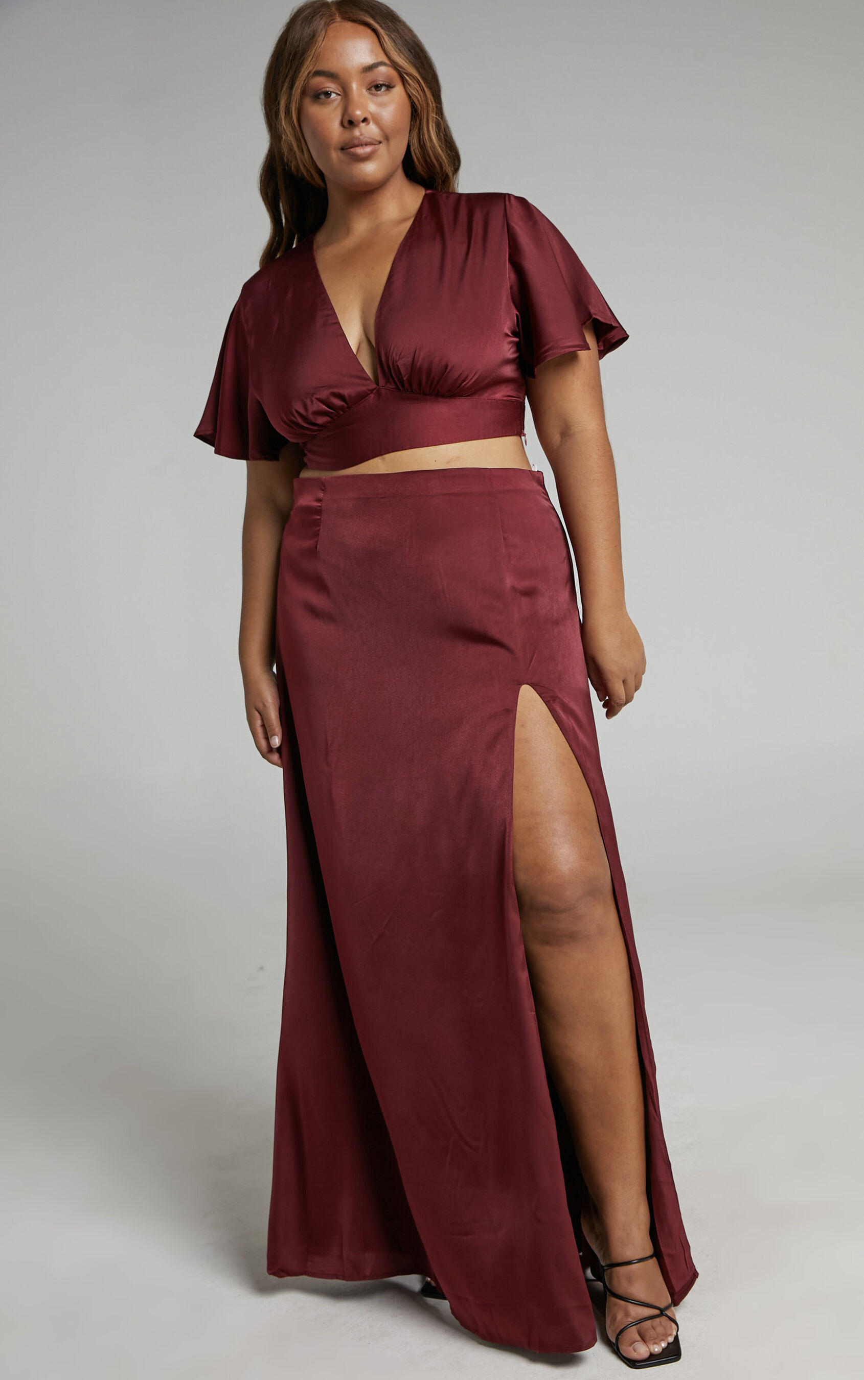 kelcie-two-piece-formal-skirt-set-with-flutter-sleeve-crop-top-in-wine