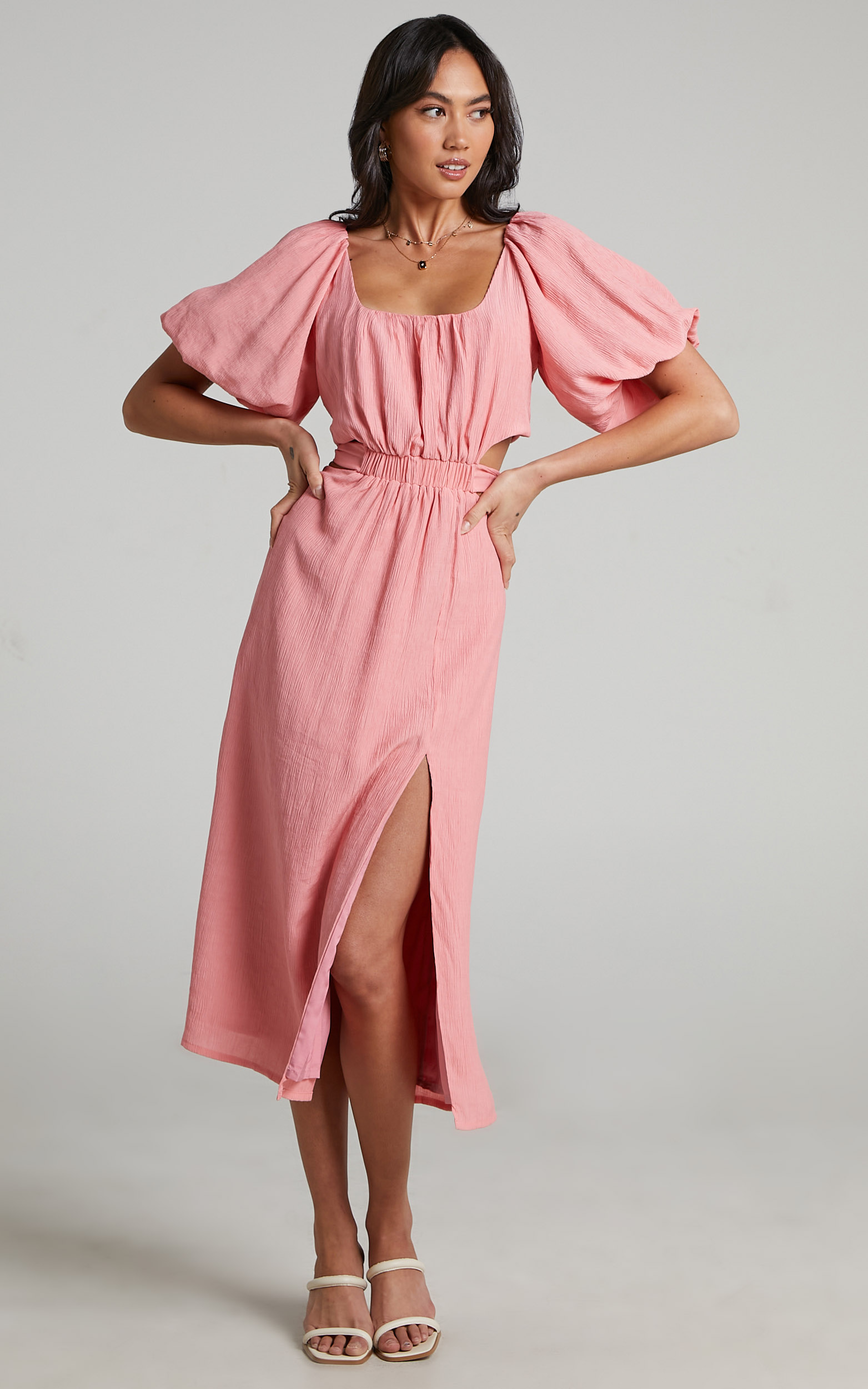 pristina-puff-sleeve-cut-out-midi-dress-in-coral