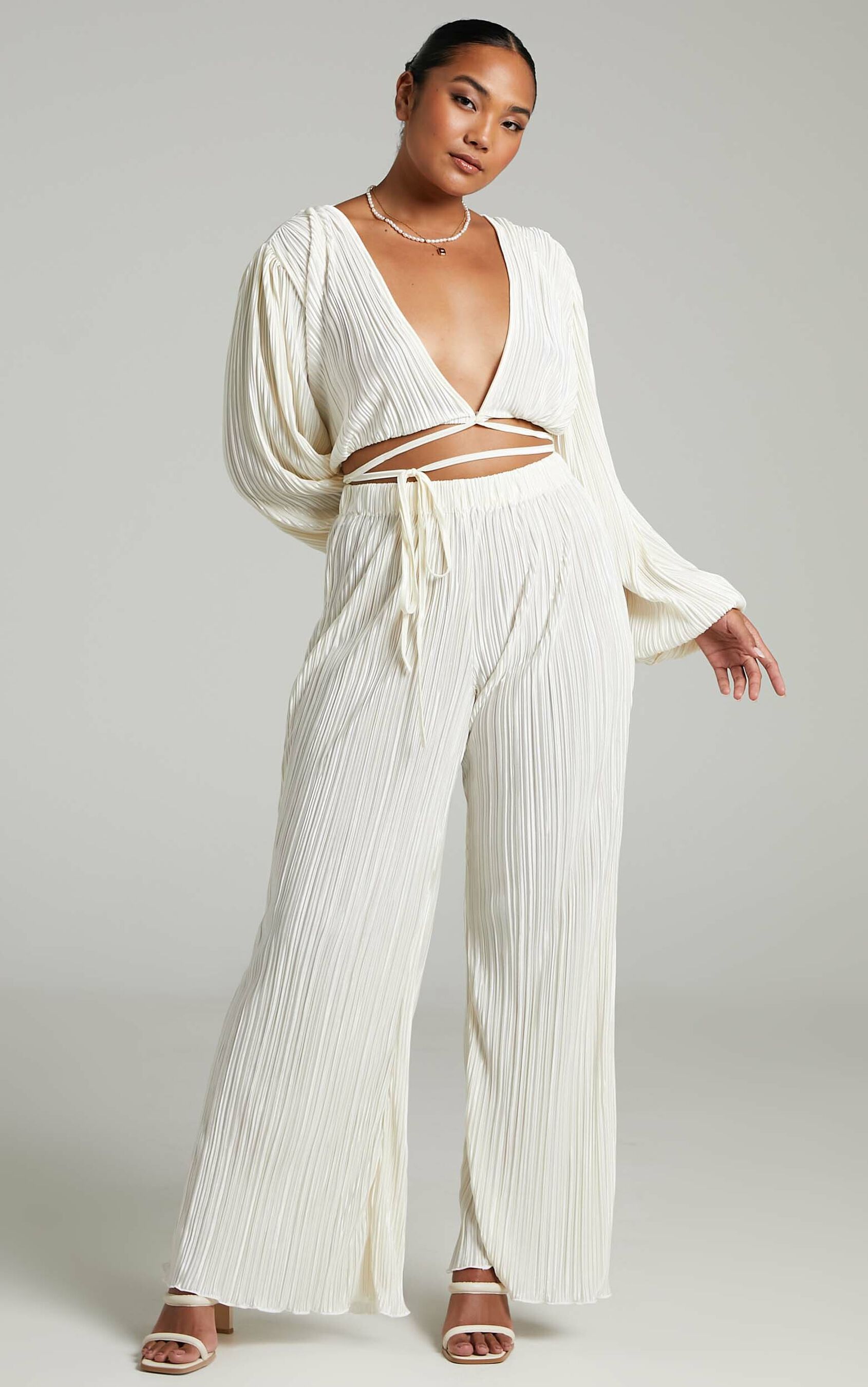 beca-plisse-flared-pants-in-cream