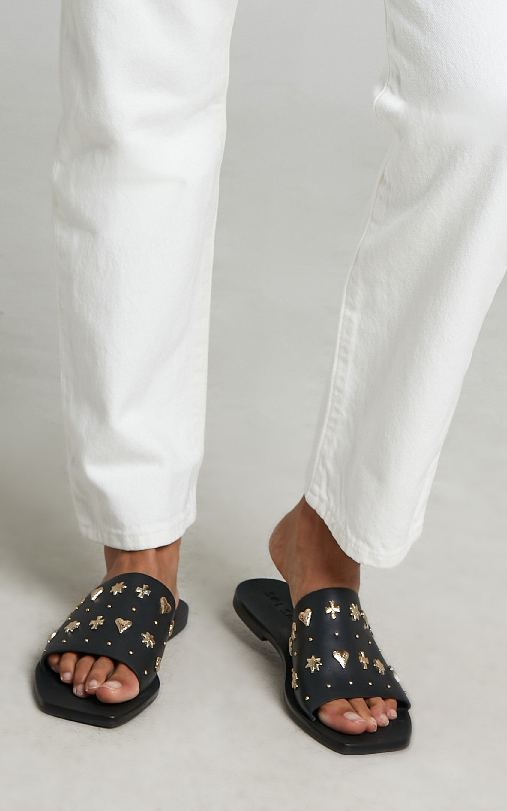 sol-sana-mila-slide-sandals-in-black-and-gold