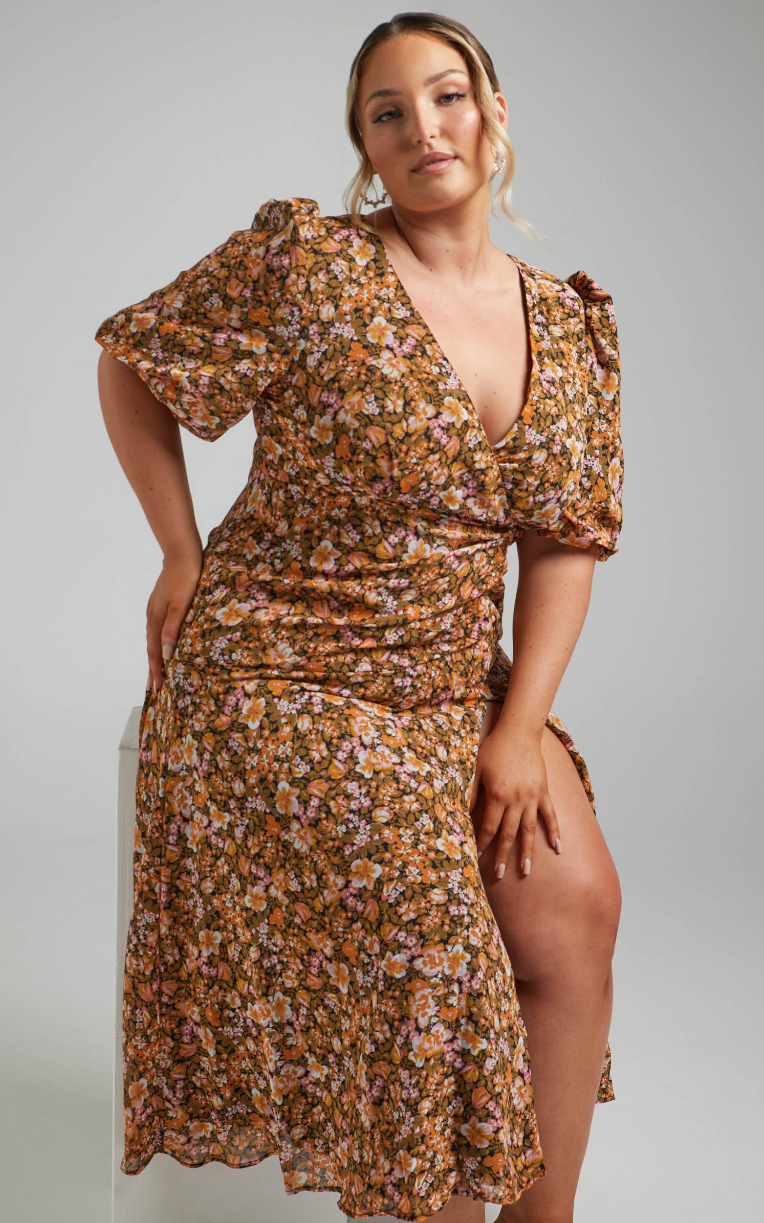 loree-puff-sleeve-midi-dress-in-black-floral