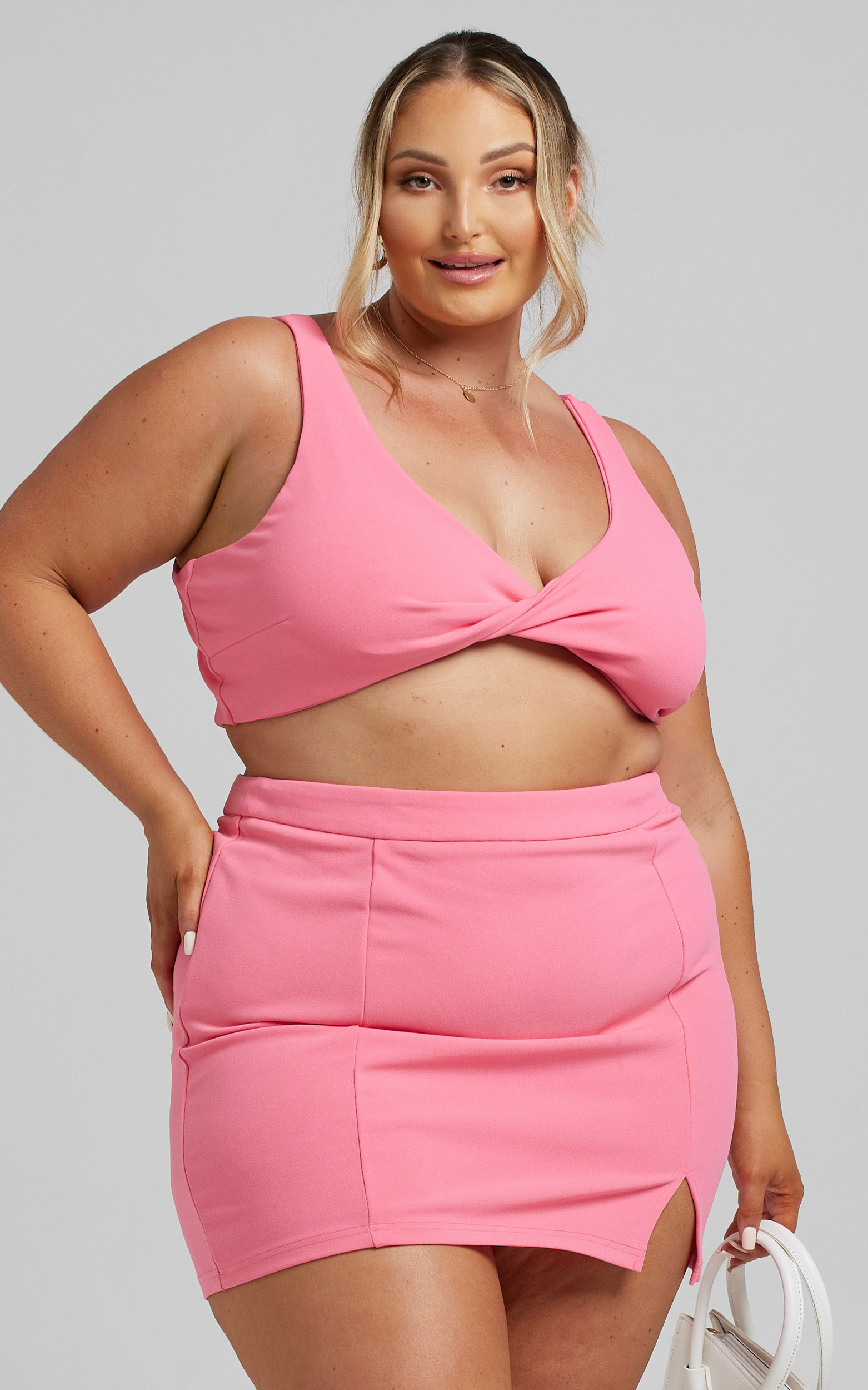 JETT_TWIST_DETAIL_MINI_TWO_PIECE_IN_BUBBLEGUM_PINK